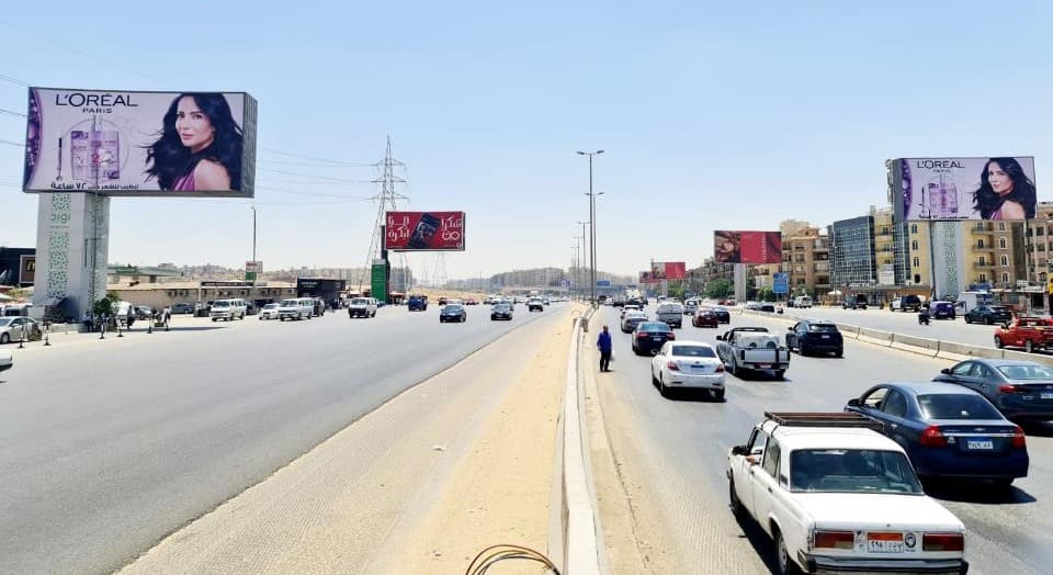 Two DIGI billboards carrying paired L'Oréal Paris campaigns